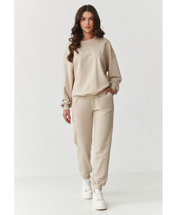 Moteriškas sportinių kelnių komplektas su išsiuvinėtu logotipu šviesiai smėlio spalvos M889