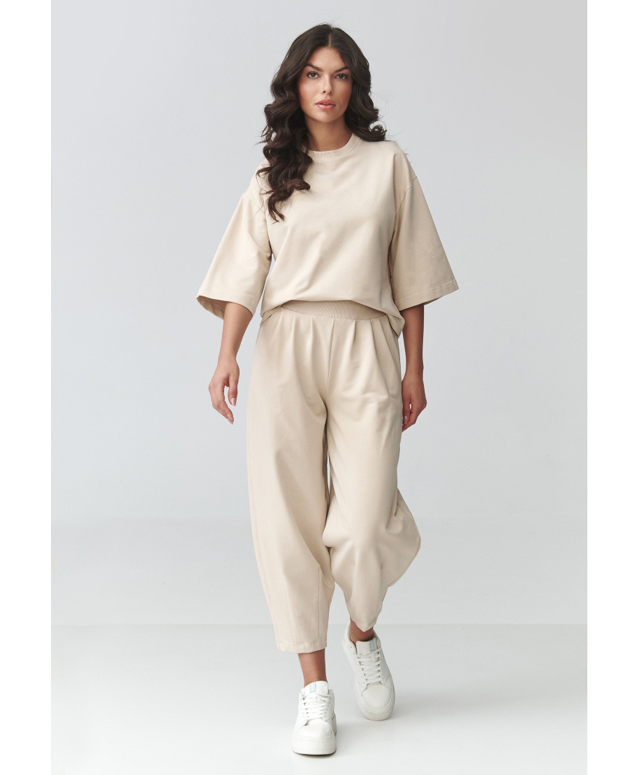 Sieviešu sporta kostīms ar "balloon" biksēm, gaiši bēšs M916