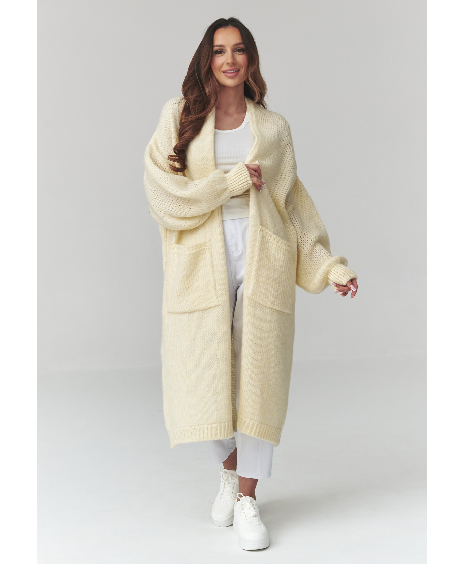 ilgas megztinis moteriskas kardiganas su kisenemis bananowy S172